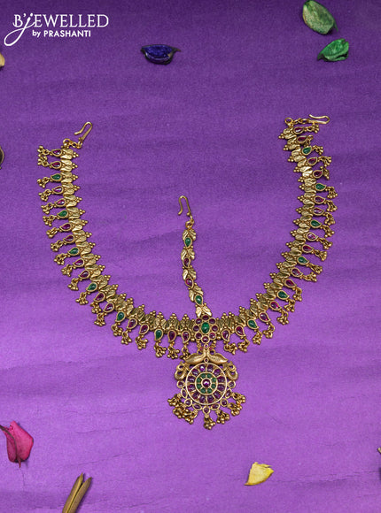 Antique maang tikka with kemp stone and golden beads hanging