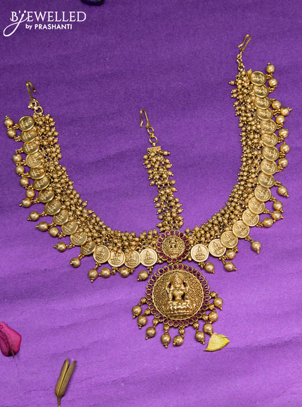 Antique lakshmi design maang tikka with pink kemp stone and golden beads hanging