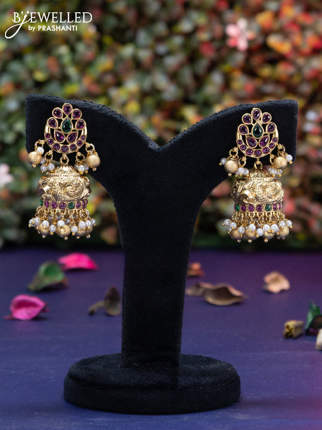 Antique jhumka peacock design with kemp & cz stones and golden beads hangings