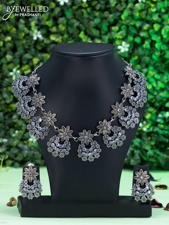 Oxidised necklace floral design with peach and cz stones