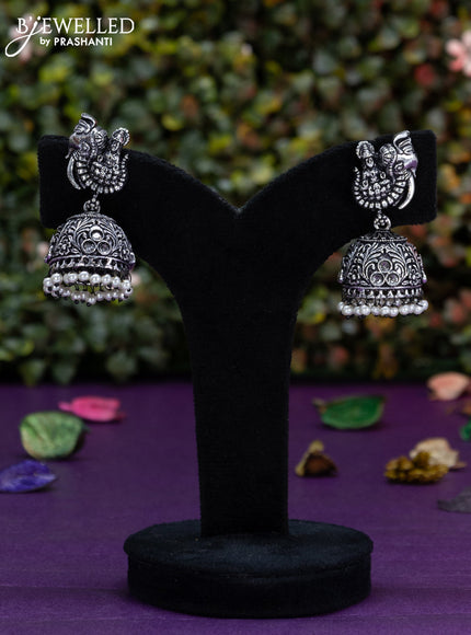 Oxidised jhumka lakshmi design with cz stones and pearl hangings