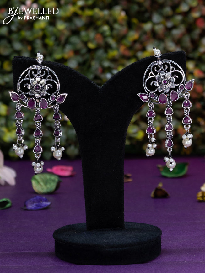 Oxidised earring floral design with ruby stones and pearl hangings