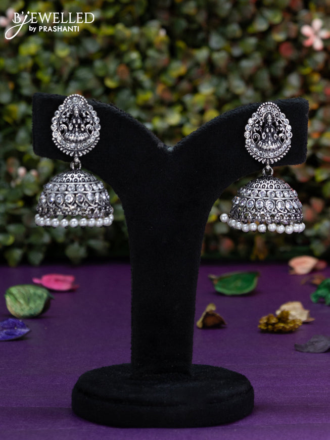 Oxidised jhumka lakshmi design with cz stones and pearl hangings