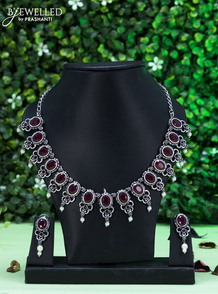 Oxidised necklace with maroon stones and pearl hangings