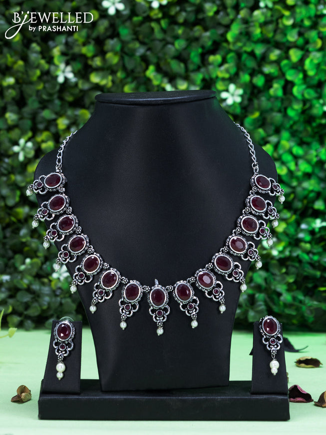 Oxidised necklace with maroon stones and pearl hangings