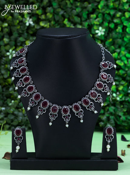 Oxidised necklace with maroon stones and pearl hangings