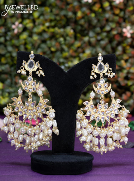 Fashion dangler chanbali cream minakari earrings with kundan stones and pearl hangings