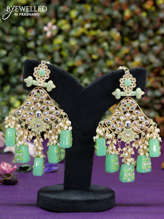 Fashion dangler minakari teal green earrings with kundan stones and beads hangings