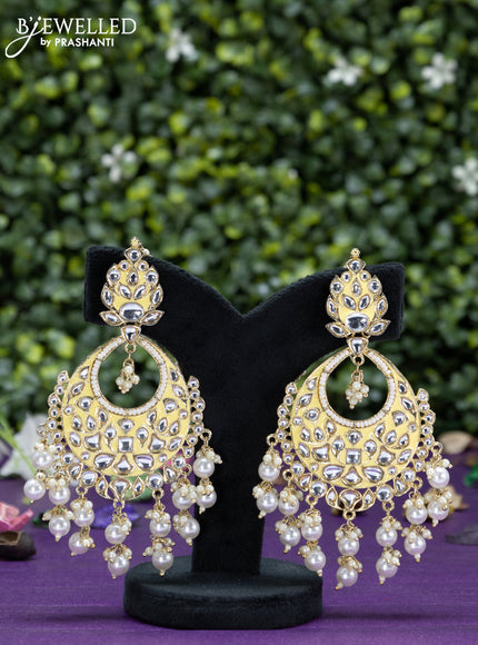 Fashion dangler yellow earrings with kundan stones and beads hangings