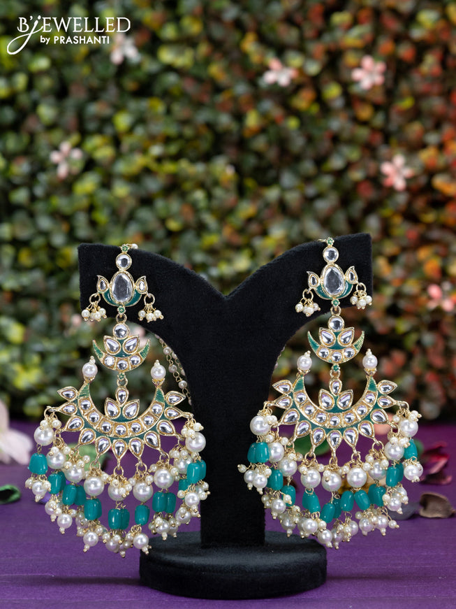 Fashion dangler teal green earrings chandbali design with kundan stones and beads hangings