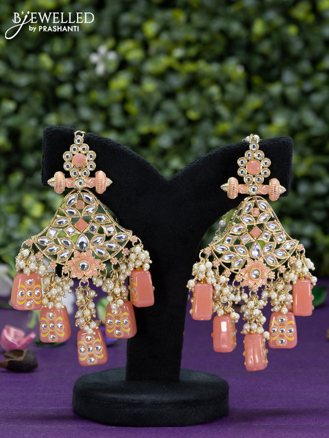 Fashion dangler peach earrings with kundan stones and beads hangings