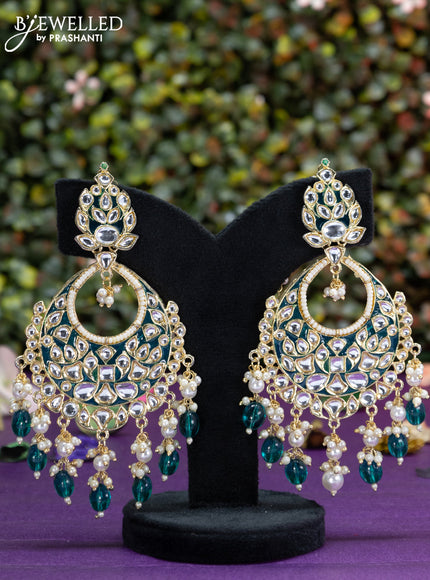 Fashion dangler teal blue earrings with kundan stones and beads hangings