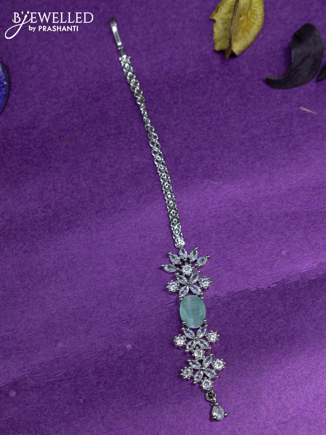 Zircon maang tikka with mint green & cz stones and hanging