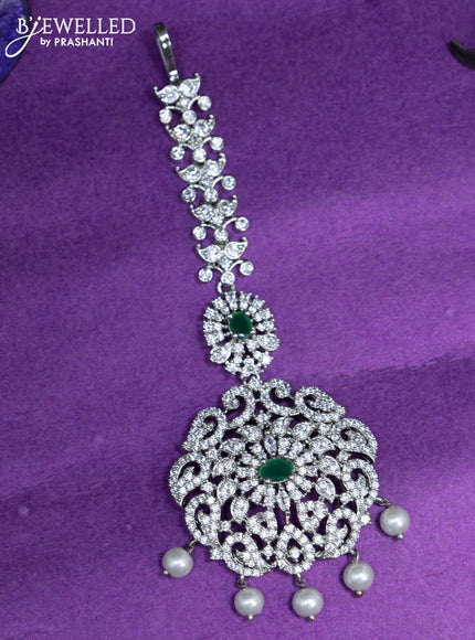 Zircon maang tikka with emerald & cz stones and pearl hangings