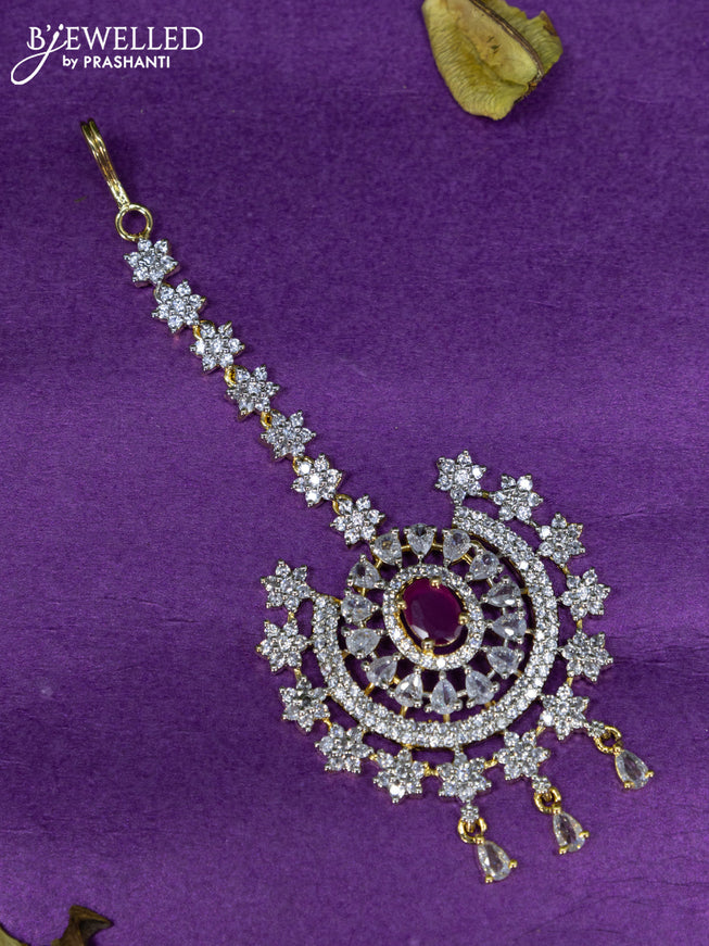 Zircon maang tikka with ruby & cz stones and hangings in gold finish