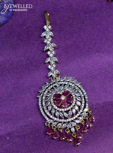 Zircon maang tikka with ruby & cz stones and pearl hangings in gold finish