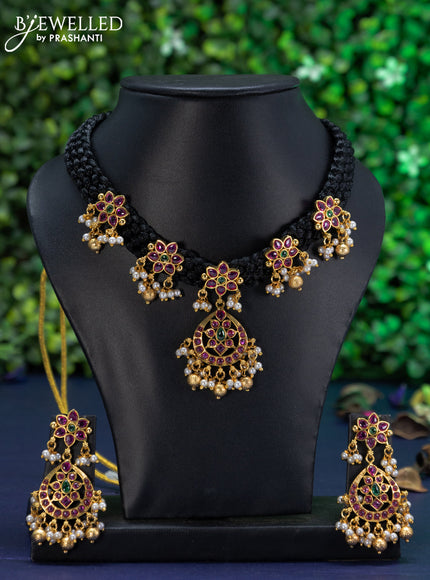 Black thread necklace kemp stones with antique floral pendant and golden beads hangings