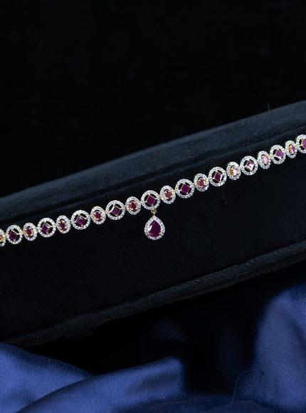 Zircon hip chain with ruby & cz stones and hanging in gold finish