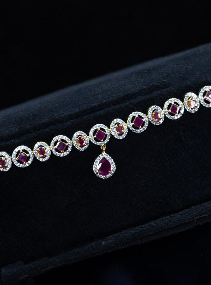 Zircon hip chain with ruby & cz stones and hanging in gold finish