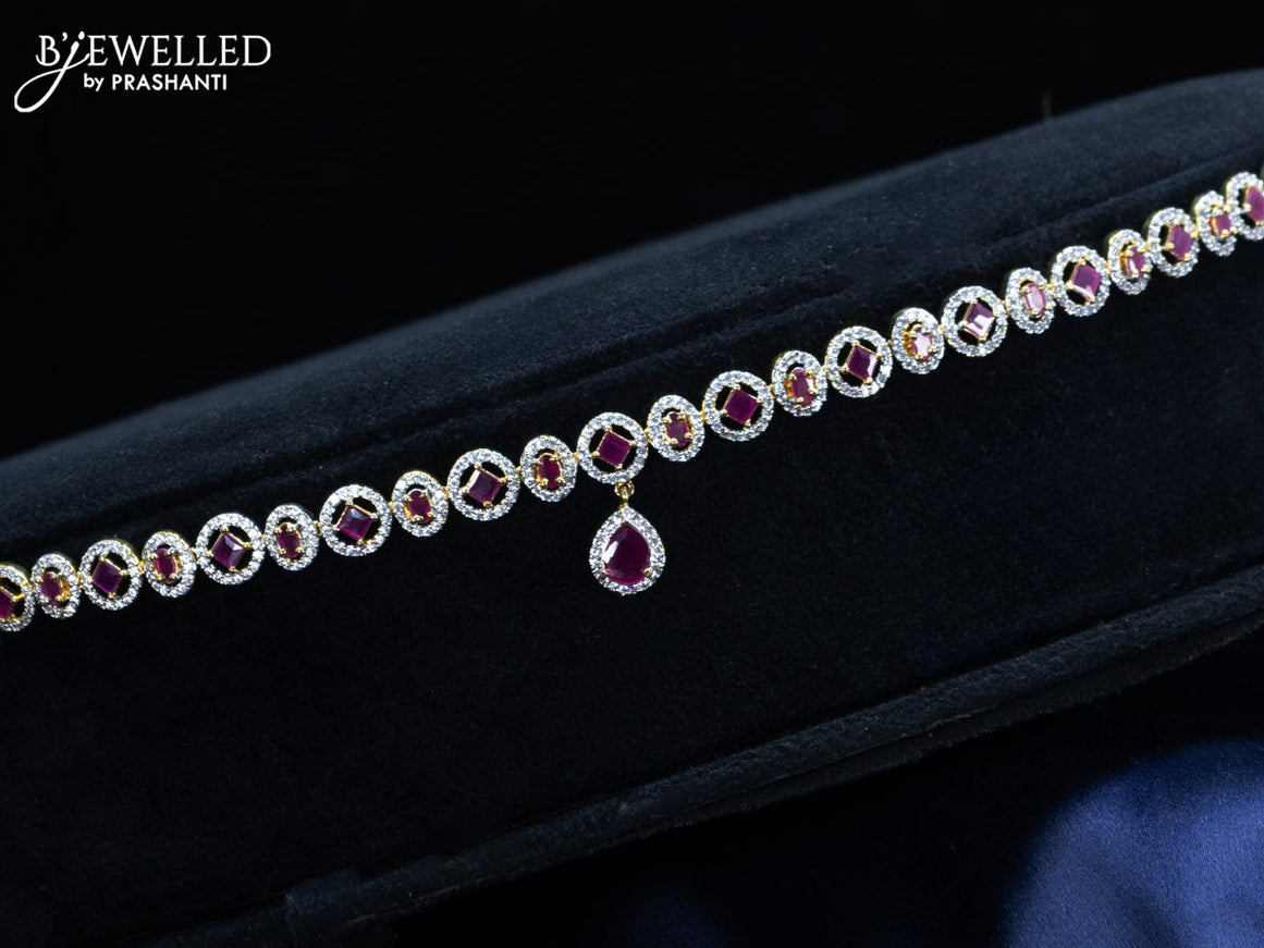 Zircon hip chain with ruby & cz stones and hanging in gold finish