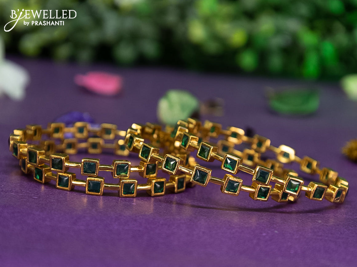 Antique bangle with emerald stones