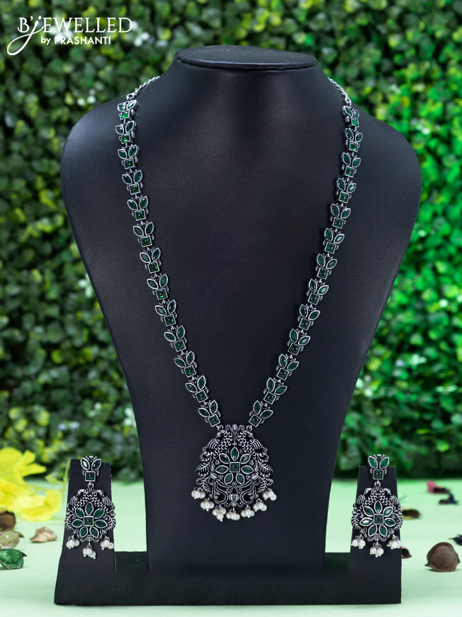 Oxidised necklace peacock design with emerald stones and pearl hangings