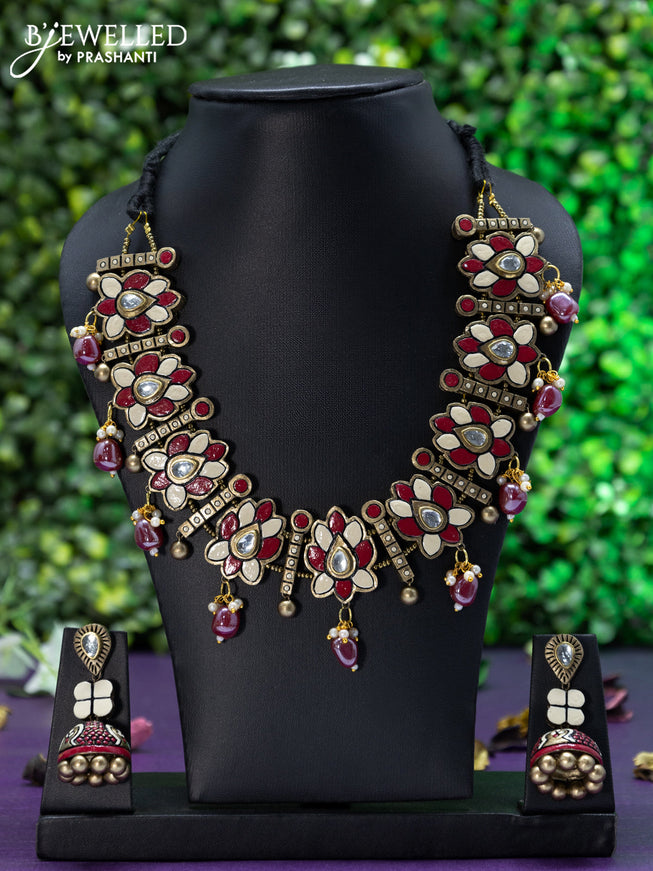 Teracotta necklace floral design with kundan stones and pink beads hangings