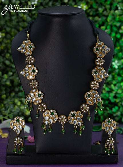 Teracotta necklace with kundan stones and beads hangings