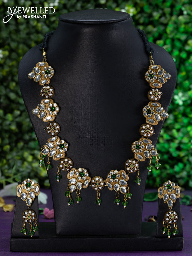 Teracotta necklace with kundan stones and beads hangings