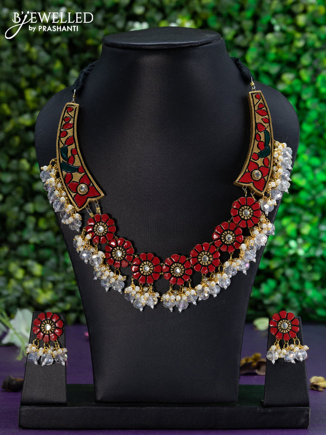 Teracotta necklace floral design with red & gold shade and beads hangings