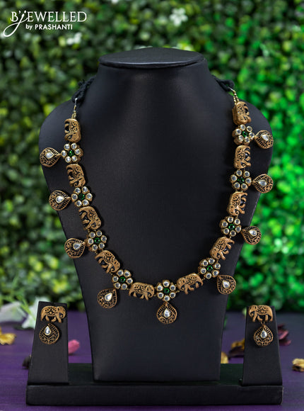 Teracotta necklace elephant design with emerald and kundan stones