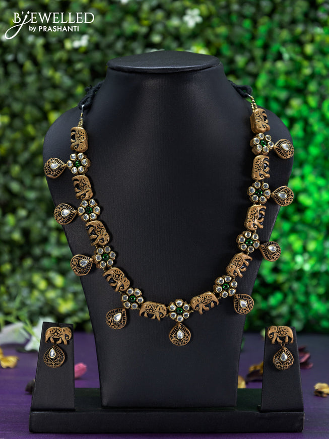 Teracotta necklace elephant design with emerald and kundan stones