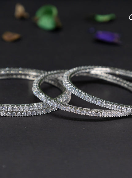 Zircon bangles with cz stones