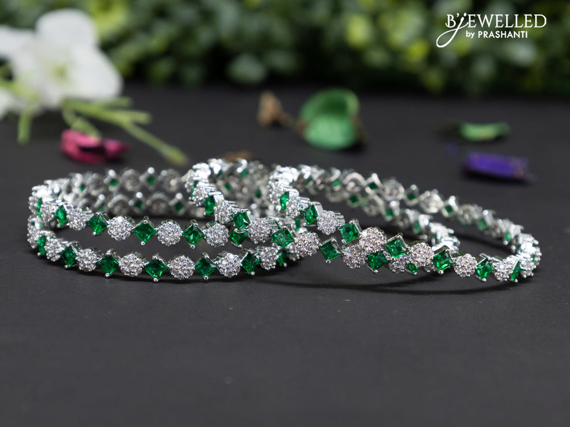 Zircon bangles with emerald and cz stones