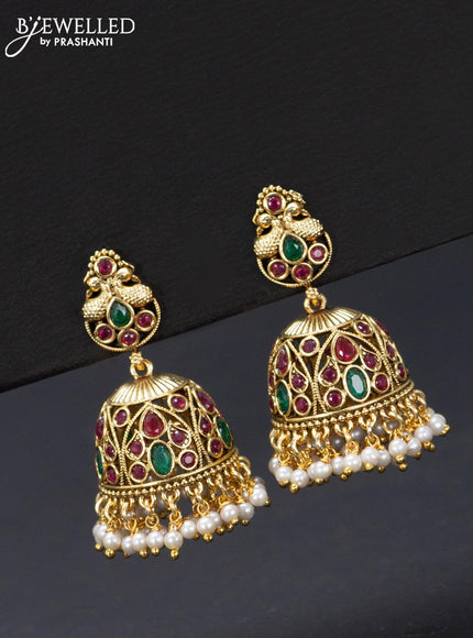 Antique jhumka peacock design with kemp stones and pearl hangings