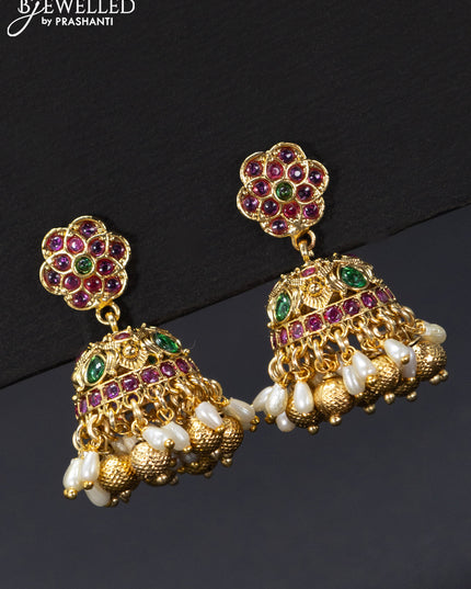 Antique jhumka peacock design with kemp stones and golden beads hangings