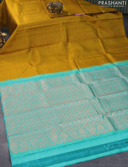 Pure kanjivaram silk saree mustard yellow and teal blue with allover copper zari weaves in borderless style