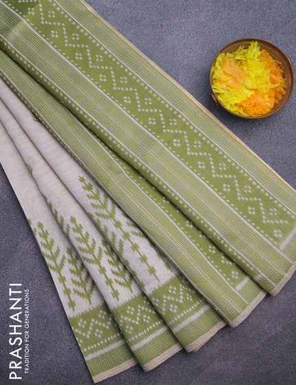 Munga cotton saree beige and light green with allover thread woven buttas and thread woven border