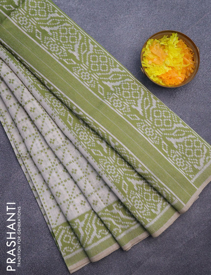 Munga cotton saree beige and light green with allover thread weaves and thread woven border