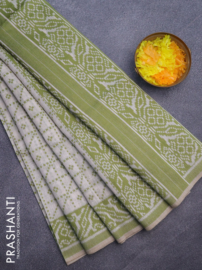 Munga cotton saree beige and light green with allover thread weaves and thread woven border