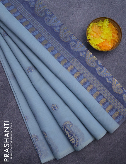 Munga cotton saree pastel blue and blue with woven buttas in borderless style