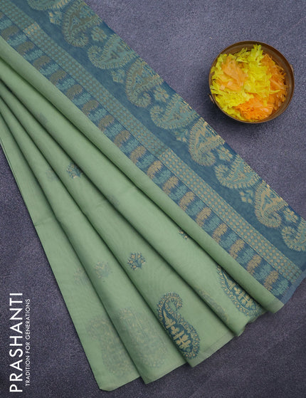 Munga cotton saree pastel green and blue with woven buttas in borderless style