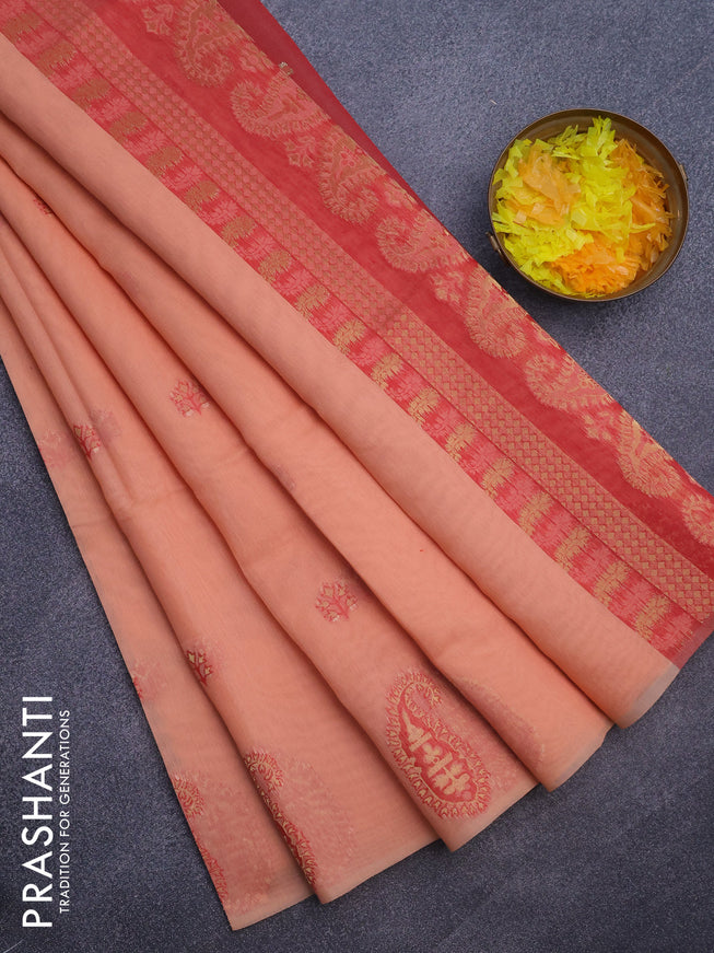 Munga cotton saree pale orange and red with woven buttas in borderless style