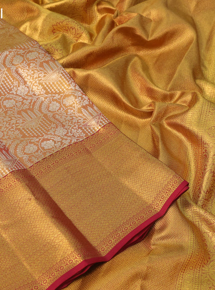 Pure kanchipuram tissue silk saree gold and maroon with allover silver zari woven butta weaves and zari woven border