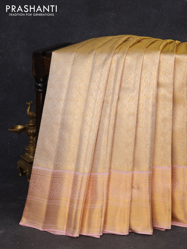 Pure kanchipuram tissue silk saree gold and peach pink with allover silver zari woven butta weaves and zari woven border