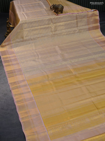 Pure kanchipuram tissue silk saree gold and peach pink with allover silver zari woven butta weaves and zari woven border