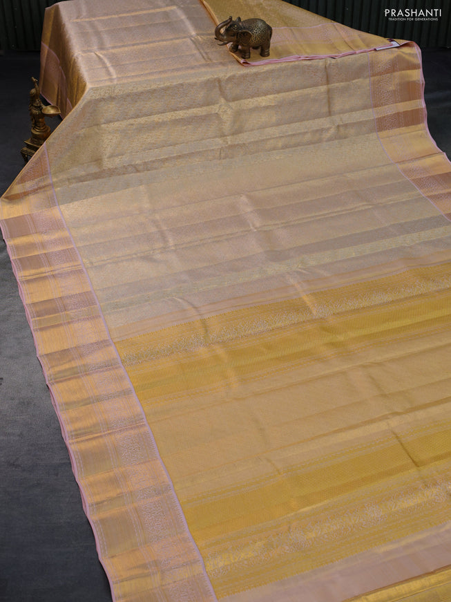 Pure kanchipuram tissue silk saree gold and peach pink with allover silver zari woven butta weaves and zari woven border