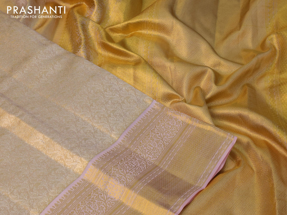 Pure kanchipuram tissue silk saree gold and peach pink with allover silver zari woven butta weaves and zari woven border