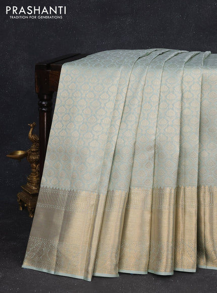 Pure kanchipuram silk saree pastel blue with allover silver zari woven brocade weaves and long zari woven border