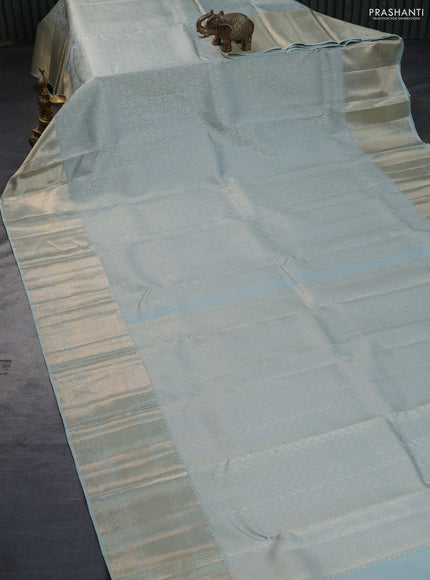 Pure kanchipuram silk saree pastel blue with allover silver zari woven brocade weaves and long zari woven border